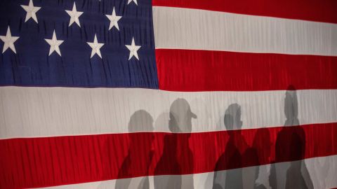 Voters attend a caucus night celebration in Des Moines.