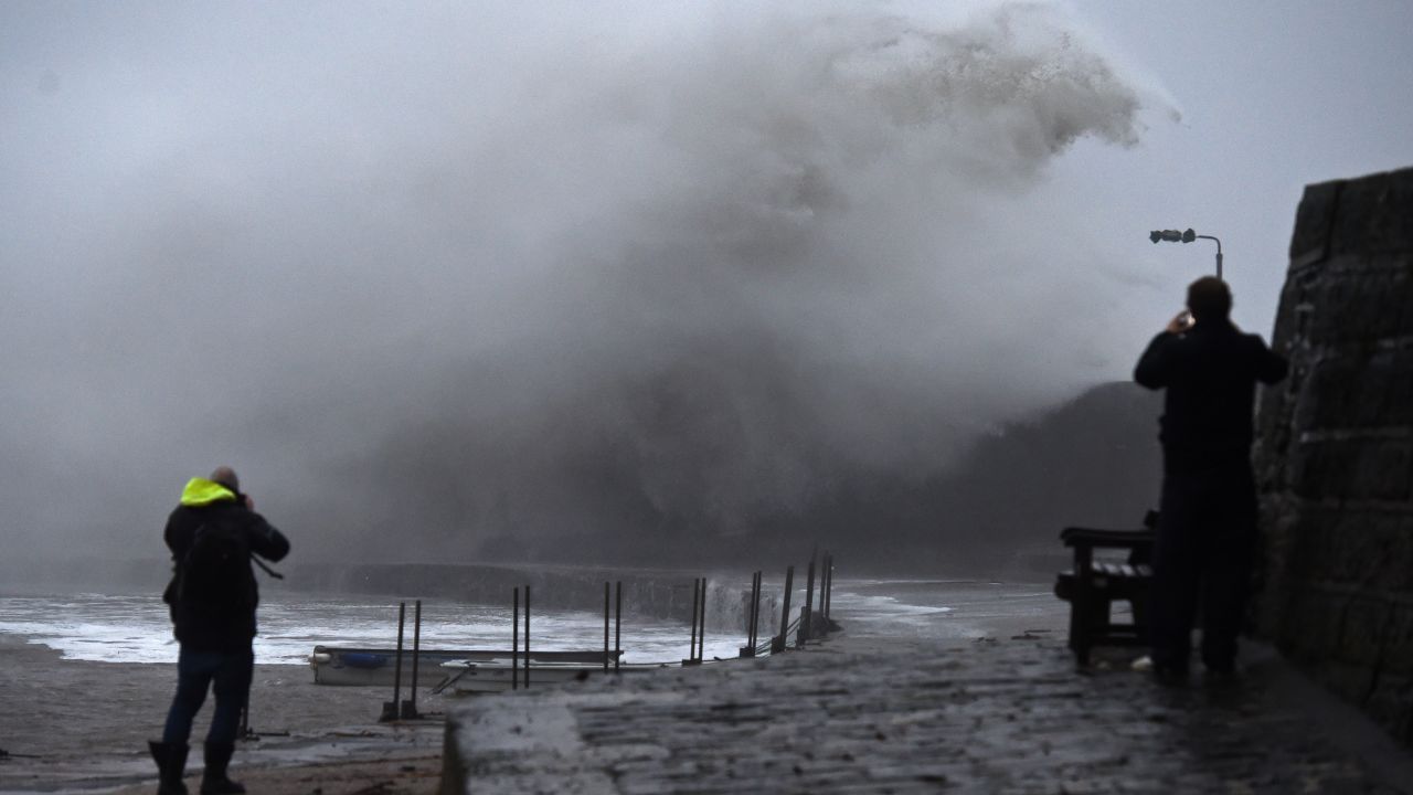 Storm Ciara causes large waves in Lyme Regis, in southwestern England, on Sunday.
