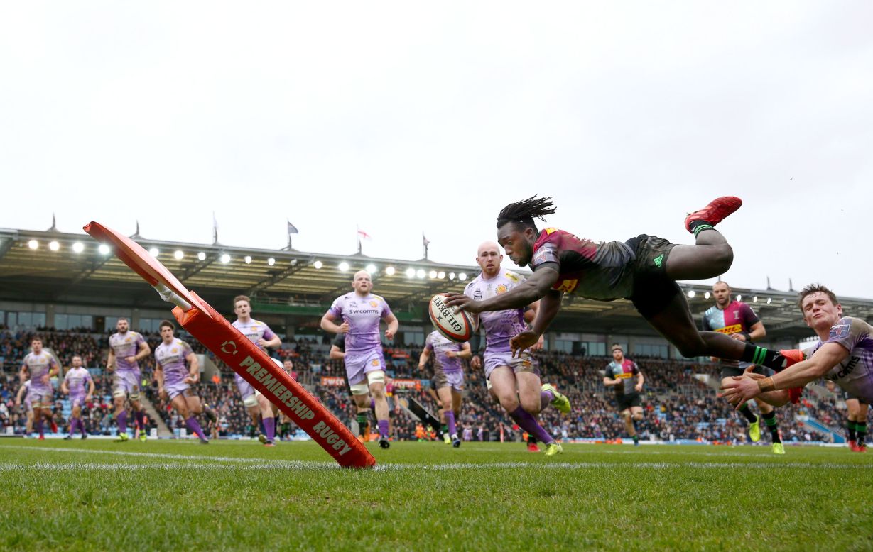 Harlequins' Gabriel Ibitoye dives for a try during a Premiership Rugby match in Exeter, England, on Sunday, February 2.