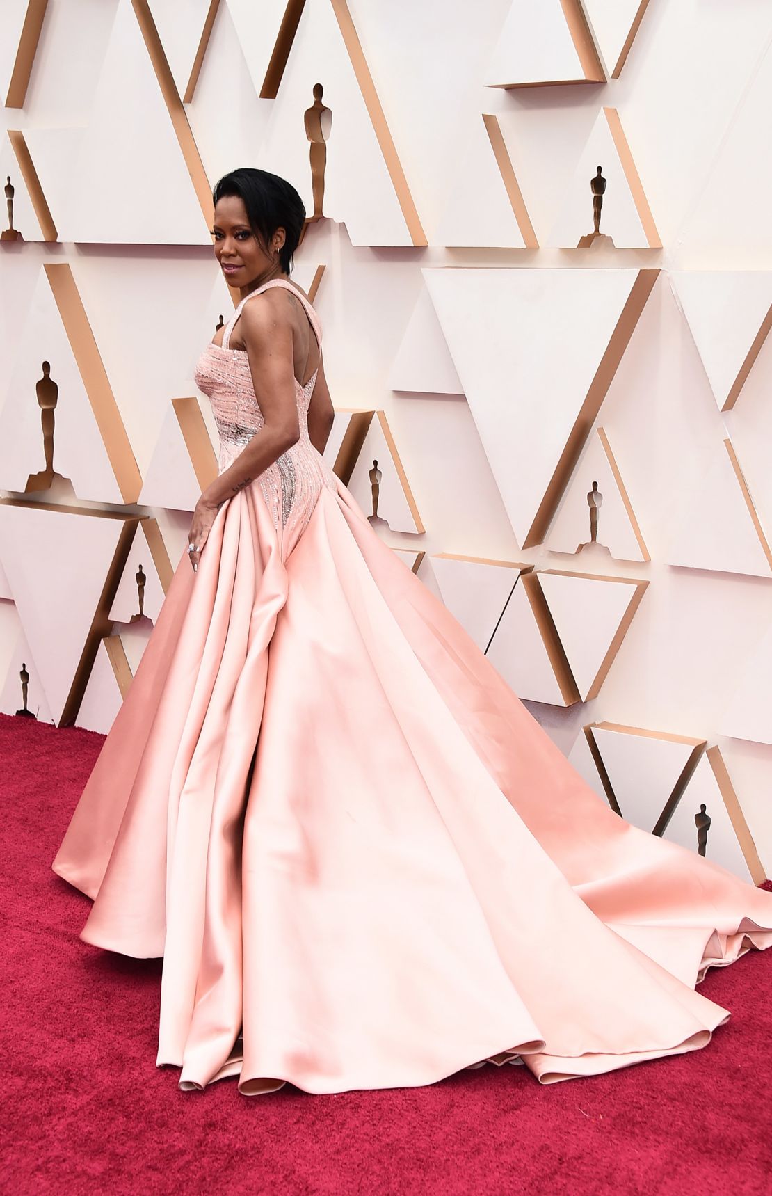 There were various shades of pink on display, from Regina King's pale pink Versace gown (pictured) to the brighter shades worn by Idina Menzel and "Parasite" actress Park So-Dam.