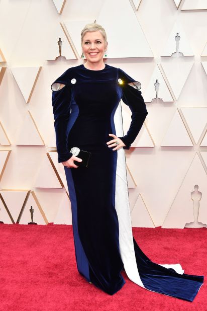 More regal vibes come courtesy of Olivia Colman, who's arrived on the red carpet wearing a midnight blue form-fitting gown with puffy teardrop-shaped sleeves and a cape. The actress was among the first presenters announced for the 2020 Oscars.