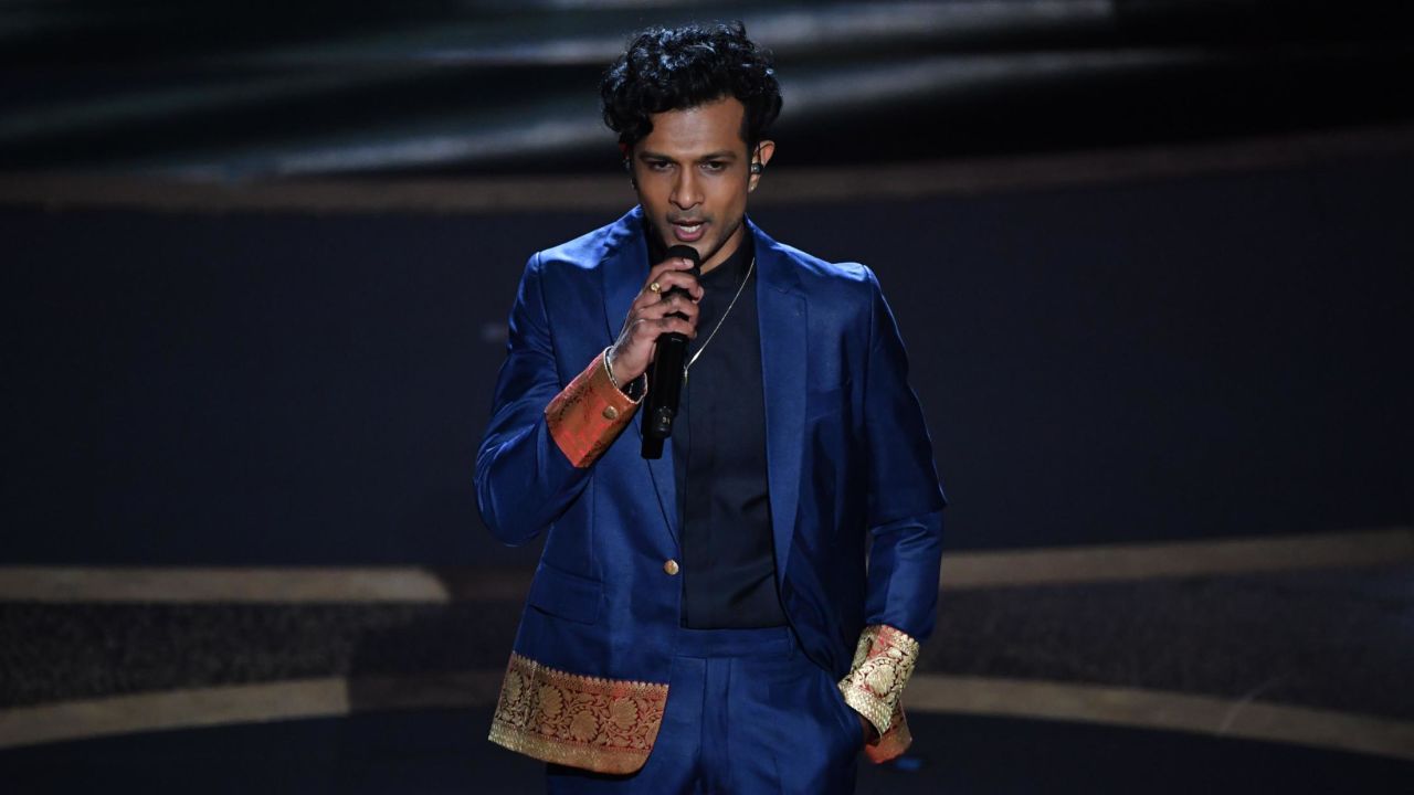 Utkarsh Ambudkar performs onstage during the 92nd Oscars. (Photo by MARK RALSTON/AFP via Getty Images)