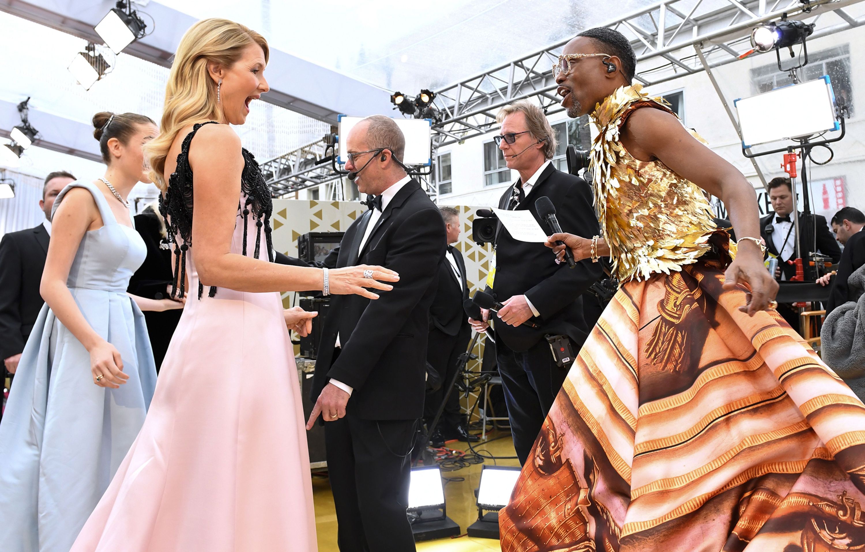 Laura Dern greets Billy Porter on the Oscars red carpet on Sunday, February 9.