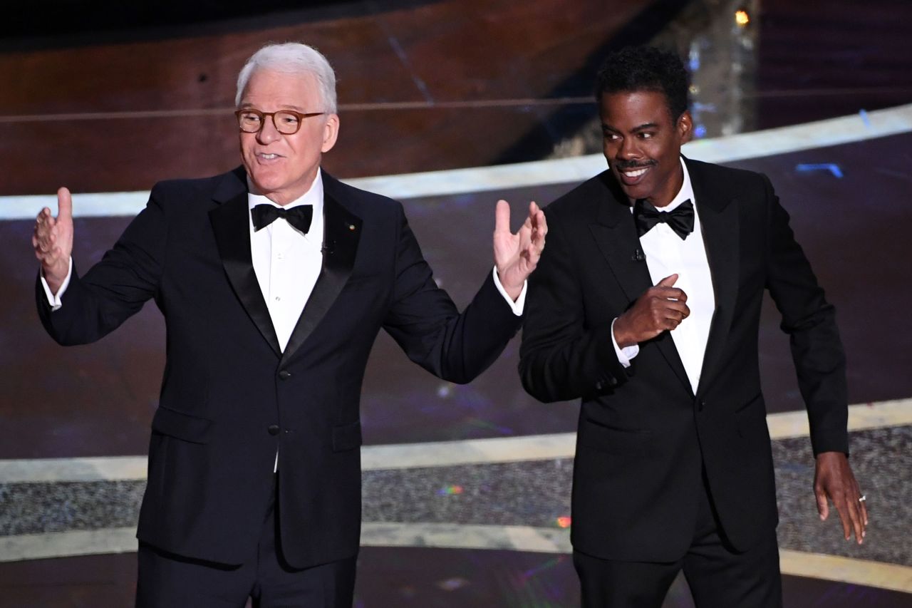 Steve Martin, left, and Chris Rock deliver jokes at the start of the show.