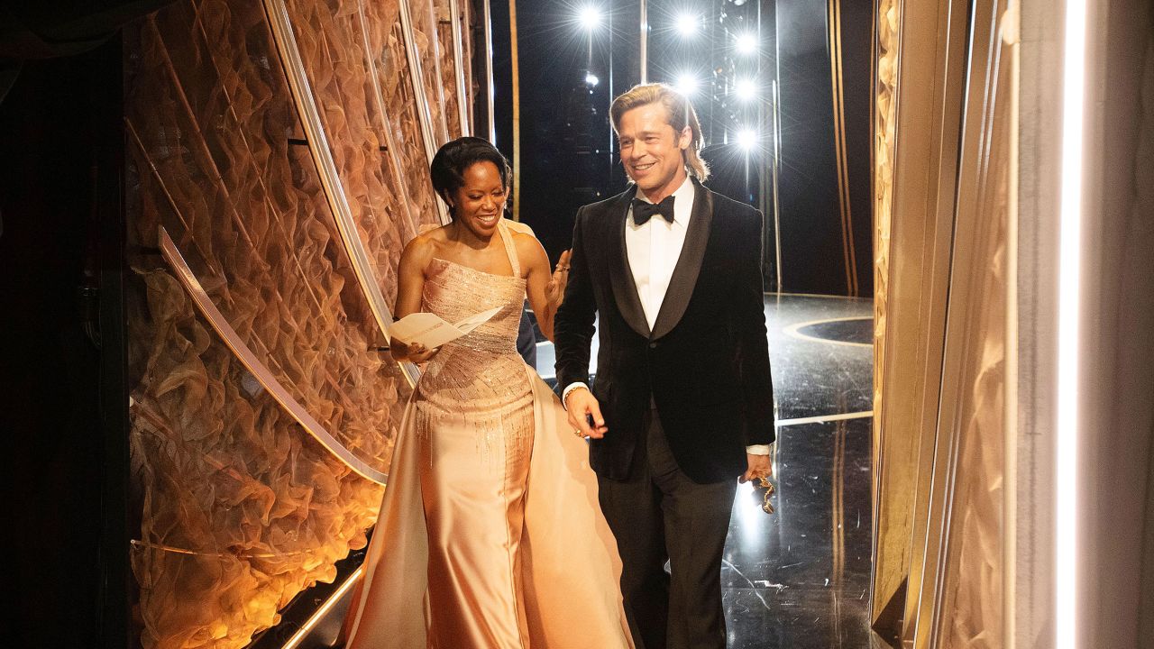 Regina King and Brad Pitt walk off stage after Pitt won the Academy Award for best supporting actor. Pitt won for his role as a stunt double in "Once Upon a Time in Hollywood."