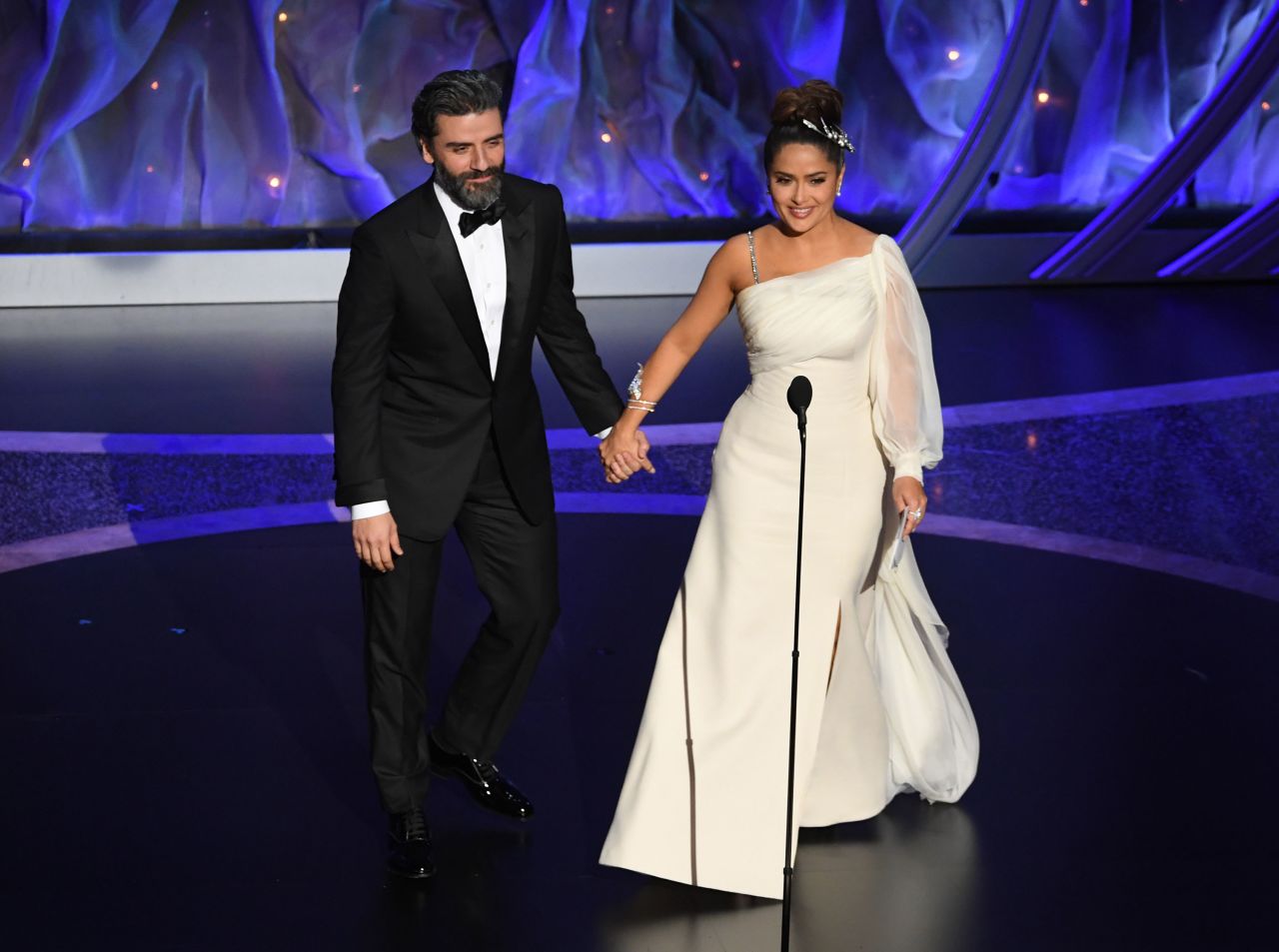 Oscar Isaac and Salma Hayek present awards during the show. Hayek joked that she was finally on stage with an Oscar.