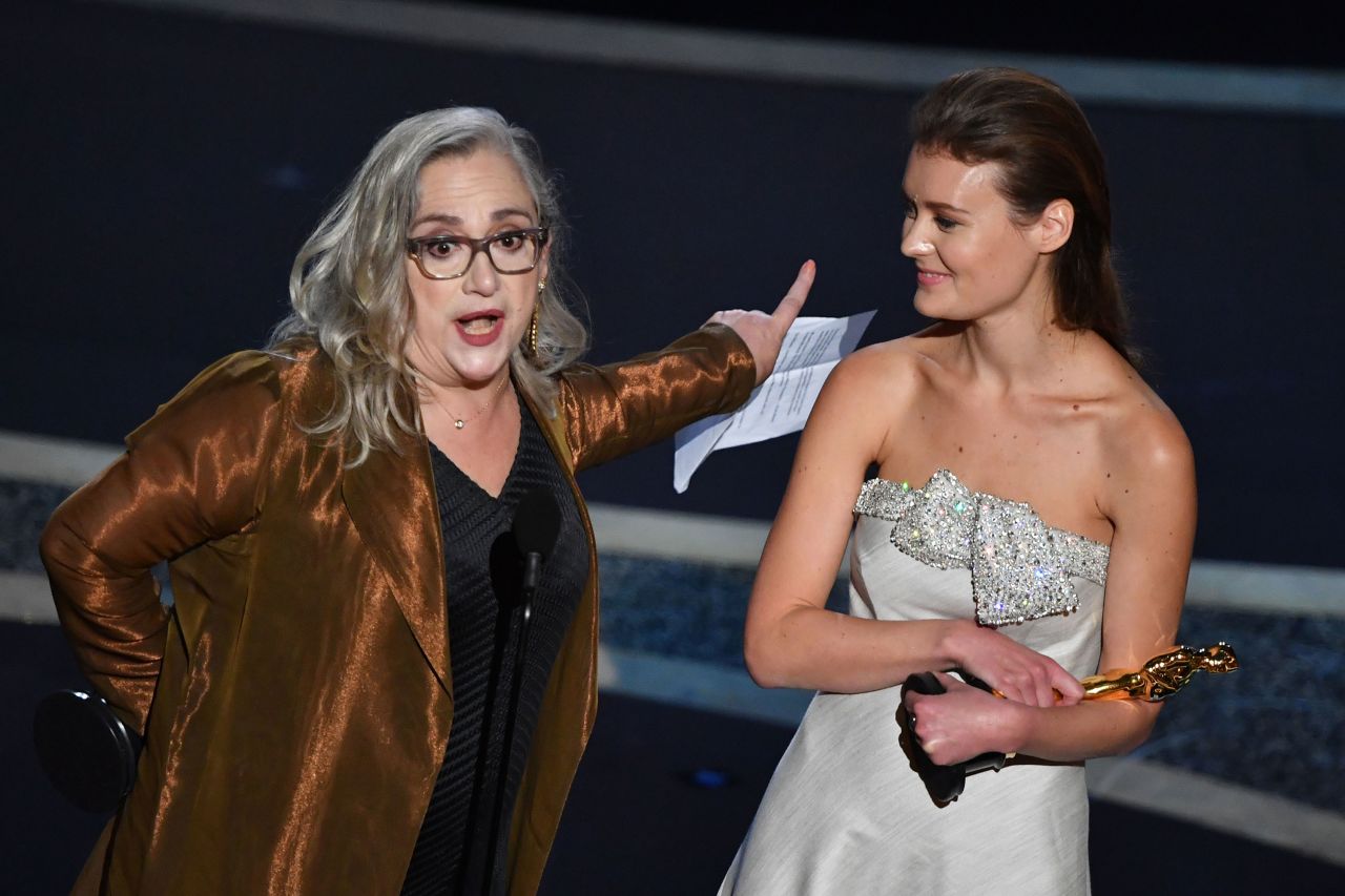 Filmmakers Carol Dysinger, left, and Elena Andreicheva accept the Oscar for best documentary, short subject. It went to "Learning to Skateboard in a Warzone (If You're a Girl)."