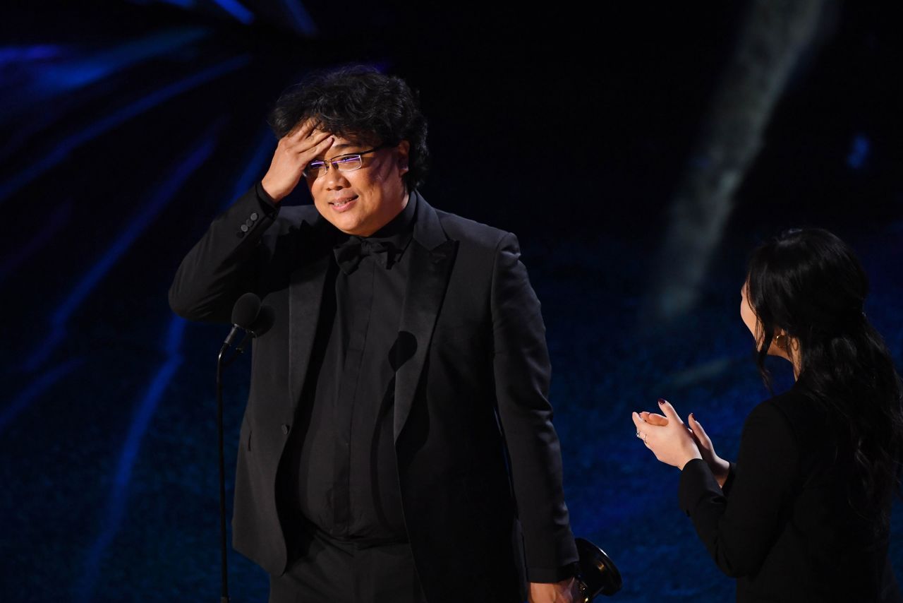 "Parasite" director Bong Joon Ho accepts the Oscar for best director. "When I was in school I would always study Martin Scorsese films," <a href="https://www.cnn.com/entertainment/live-news/oscars-2020/h_b95cf4ef837846527ede132dc47f6170" target="_blank">he said.</a> "Just to be nominated is a huge honor. I never imagined I would win."