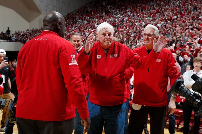Former Indiana basketball coach Bob Knight waves to fans on Saturday, February 8, after <a  target="_blank">returning to the school</a> for the first time since his firing 20 years ago. Knight was there with players from Indiana's 1980 team, which was being celebrated at halftime of a game against Purdue.