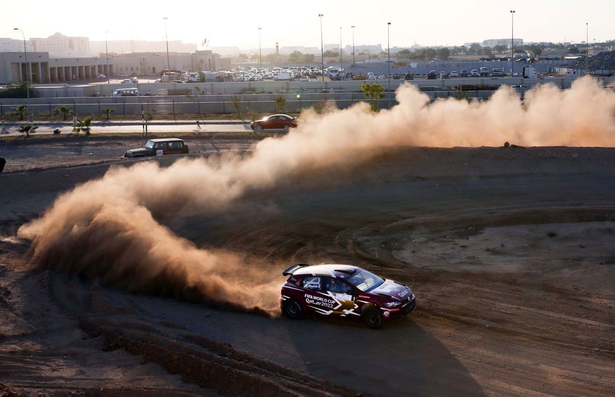 Nasser al-Attiyiah and co-driver Matthieu Baumel kick up dust on their way to winning the Oman International Rally on Thursday, February 6.