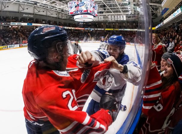 David Jesus, left, fights Brett Jacklin during an Ontario Hockey League game on Friday, February 7.