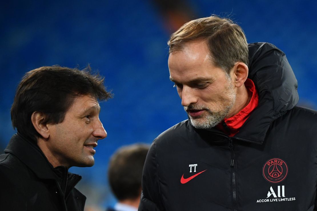Leonardo (left) speaks with PSG coach Thomas Tuchel ahead of the Champions League match against Real Madrid. 