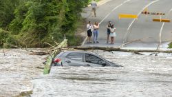 SYDNEY, AUSTRALIA - FEBRUARY 10: A submerged car is seen on a bridge over the Nepean River at Cobbitty on February 10, 2020 in Sydney, Australia. Heavy rainfall over the weekend has seen dam levels in greater Sydney rise to above 60 per cent. Warragamba Dam, which accounts for about 80 per cent of Sydney's water storage, received a year's worth of water over the past two days, rising 17.7 per cent to sit at 60.7 per cent on Monday. (Photo by Jenny Evans/Getty Images)