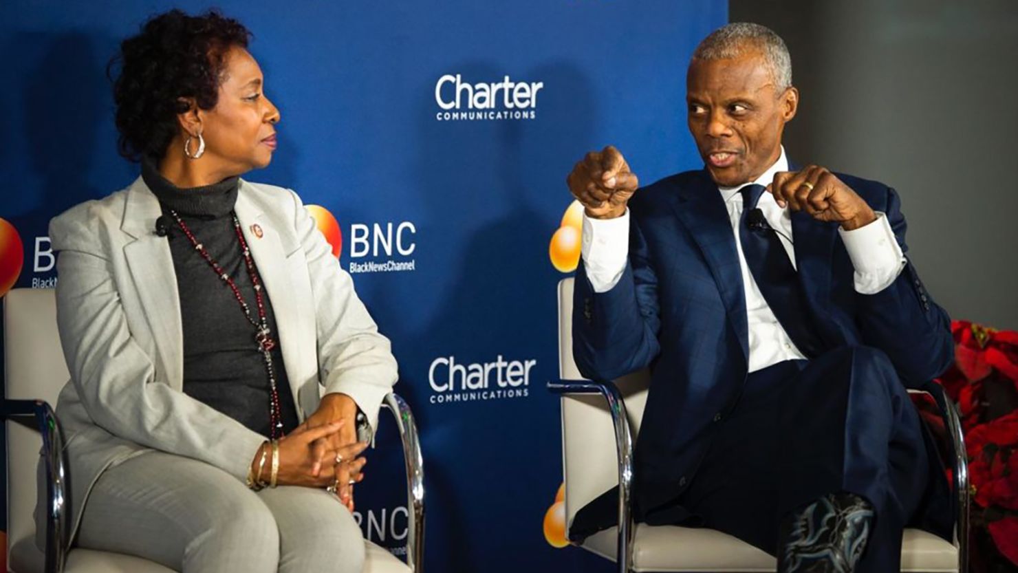 J.C. Watts (left), the co-founder of Black News channel, discusses plans for the channel with Representative Yvette D. Clarke (D-NY-9), founder of the Multicultural Media Caucus. Black News Channel is the first African American-helmed cable news channel. 