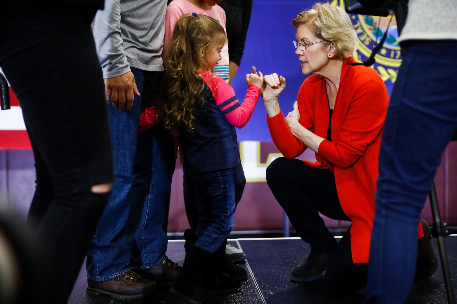 Warren makes her signature "pinky promise" during a campaign event in Lebanon, New Hampshire, on Sunday, February 9.