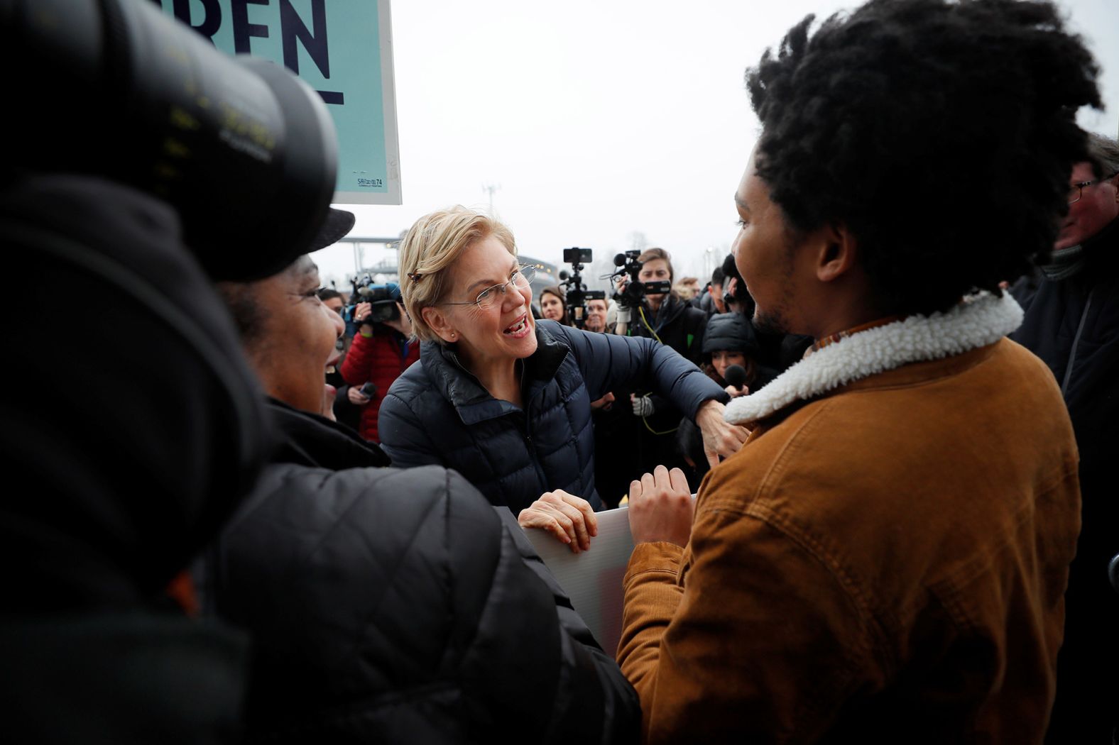Warren greets supporters outside a polling site in Nashua on February 11.