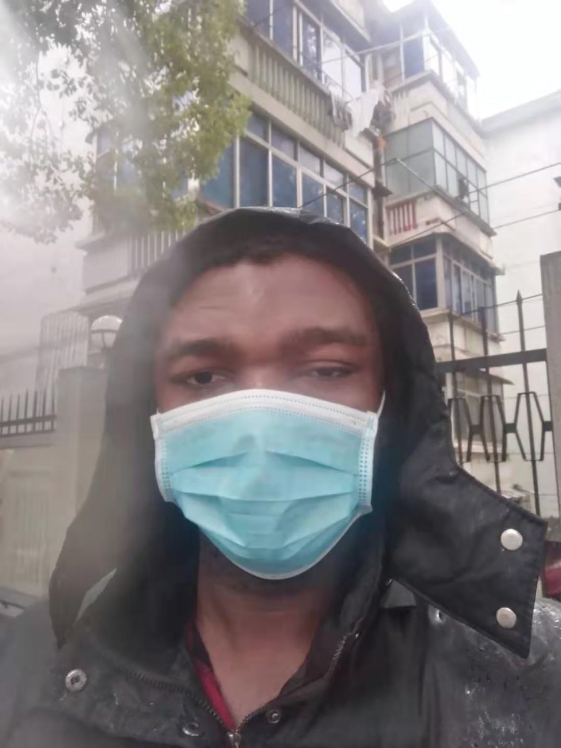 Nigerian student Victor Vincent pictured wearing a mask in Wuhan, China.