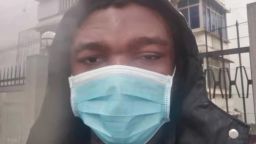 Nigerian student Victor Vincent pictured wearing a mask in Wuhan, China.