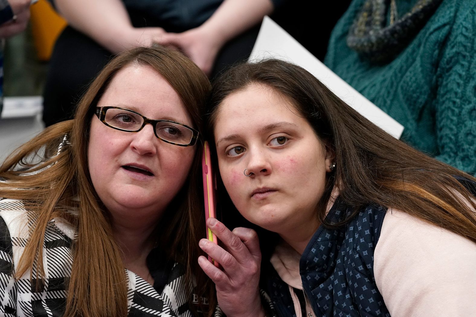 Sanders supporters listen to results in Manchester.