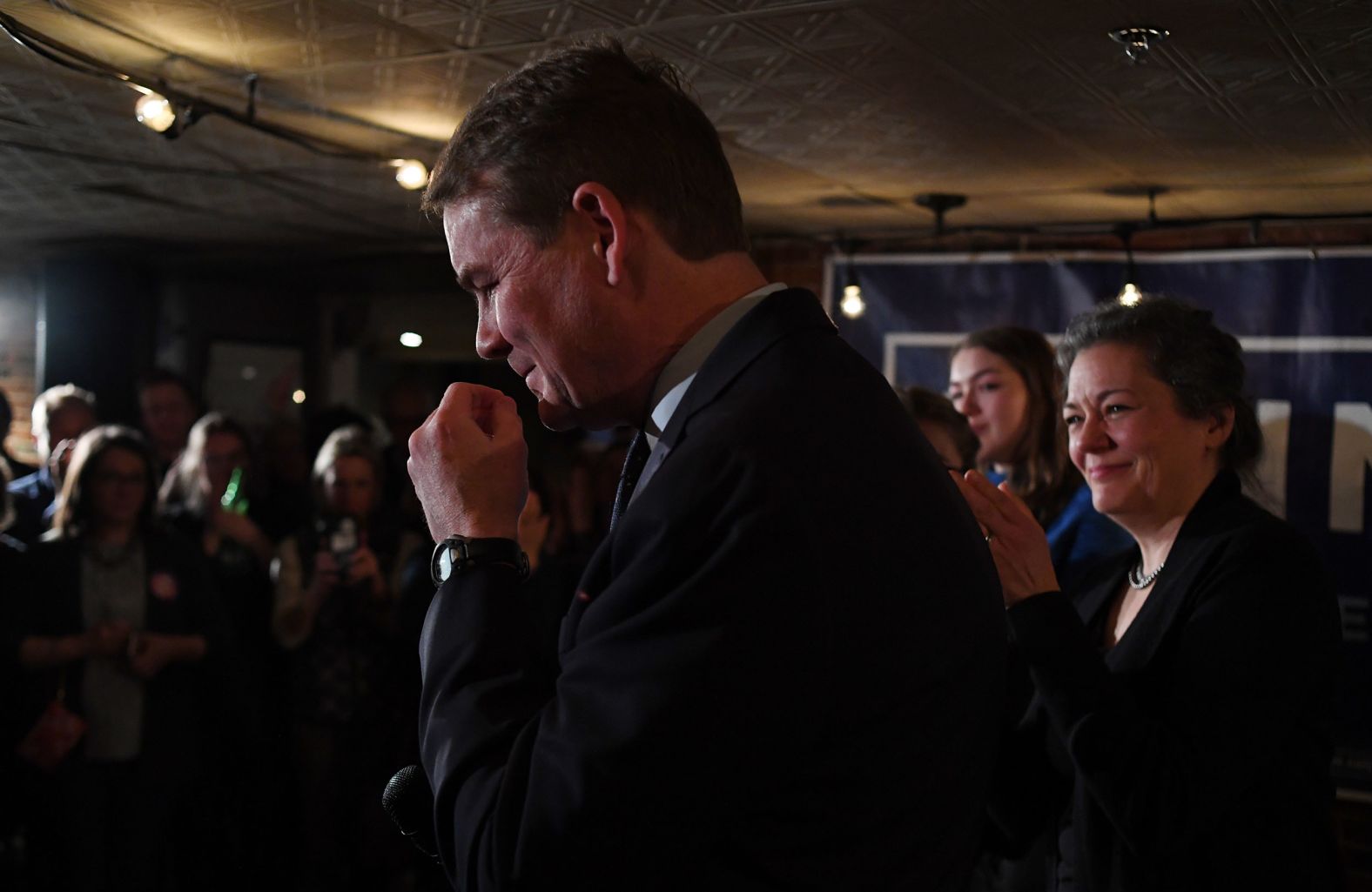 US Sen. Michael Bennet takes a moment before telling a crowd in Concord that he was <a href="index.php?page=&url=http%3A%2F%2Fwww.cnn.com%2F2020%2F02%2F11%2Fpolitics%2Fmichael-bennet-ends-2020-campaign%2Findex.html" target="_blank">dropping out of the race.</a>