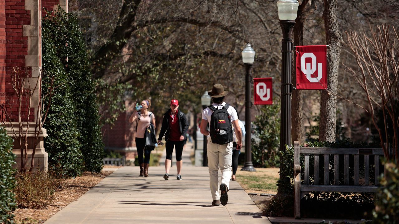 Students walk on campus between classes at the University of Oklahoma in Norman, Oklahoma.