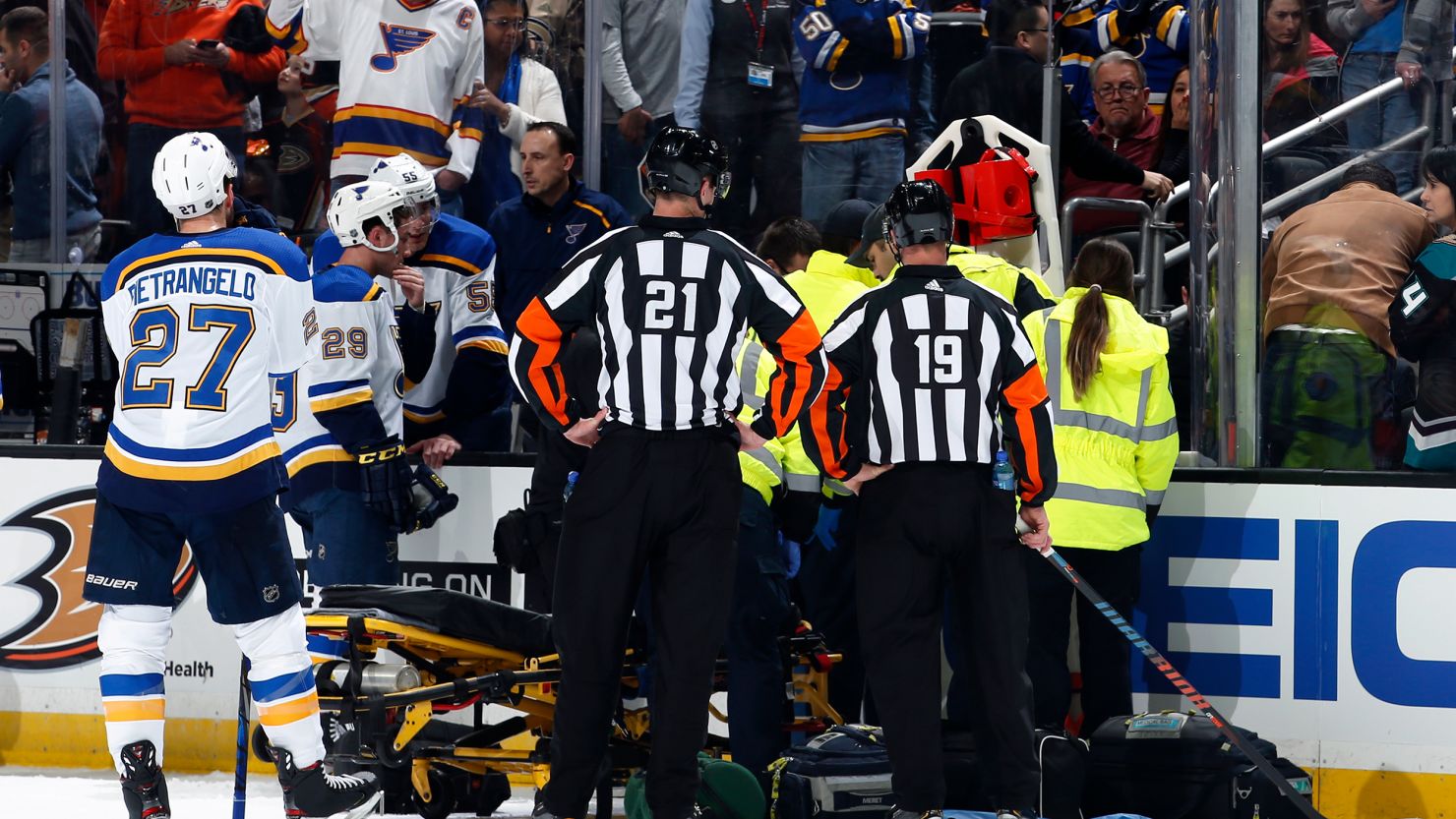 The St. Louis Blues watch as the paramedics tend to Jay Bouwmeester #19 of the St. Louis Blues after he collapsed on the bench during the first period of the game against the Anaheim Ducks at Honda Center on February 11, 2020 in Anaheim, California.