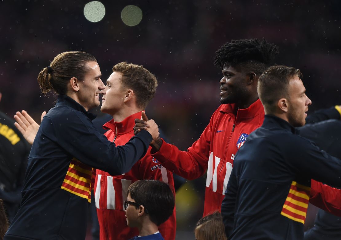 Antoine Griezmann of FC Barcelona shakes hands with former teammate Partey prior to the La Liga match against Atletico at Wanda Metropolitano on December 01, 2019.