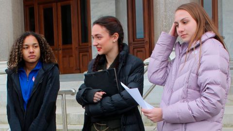 High school track athletes Alanna Smith, left, Selina Soule, center and and Chelsea Mitchell prepare to speak at a news conference outside the Connecticut State Capitol in Hartford, Connecticut, on February 12.