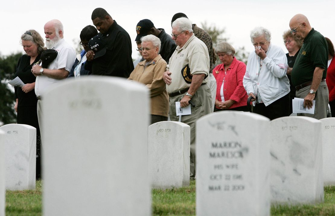 Family members of victims of the USS Cole attack attend a ceremony at the Arlington National Cemetery, Virginia, to mark the fifth anniversary of the attack.