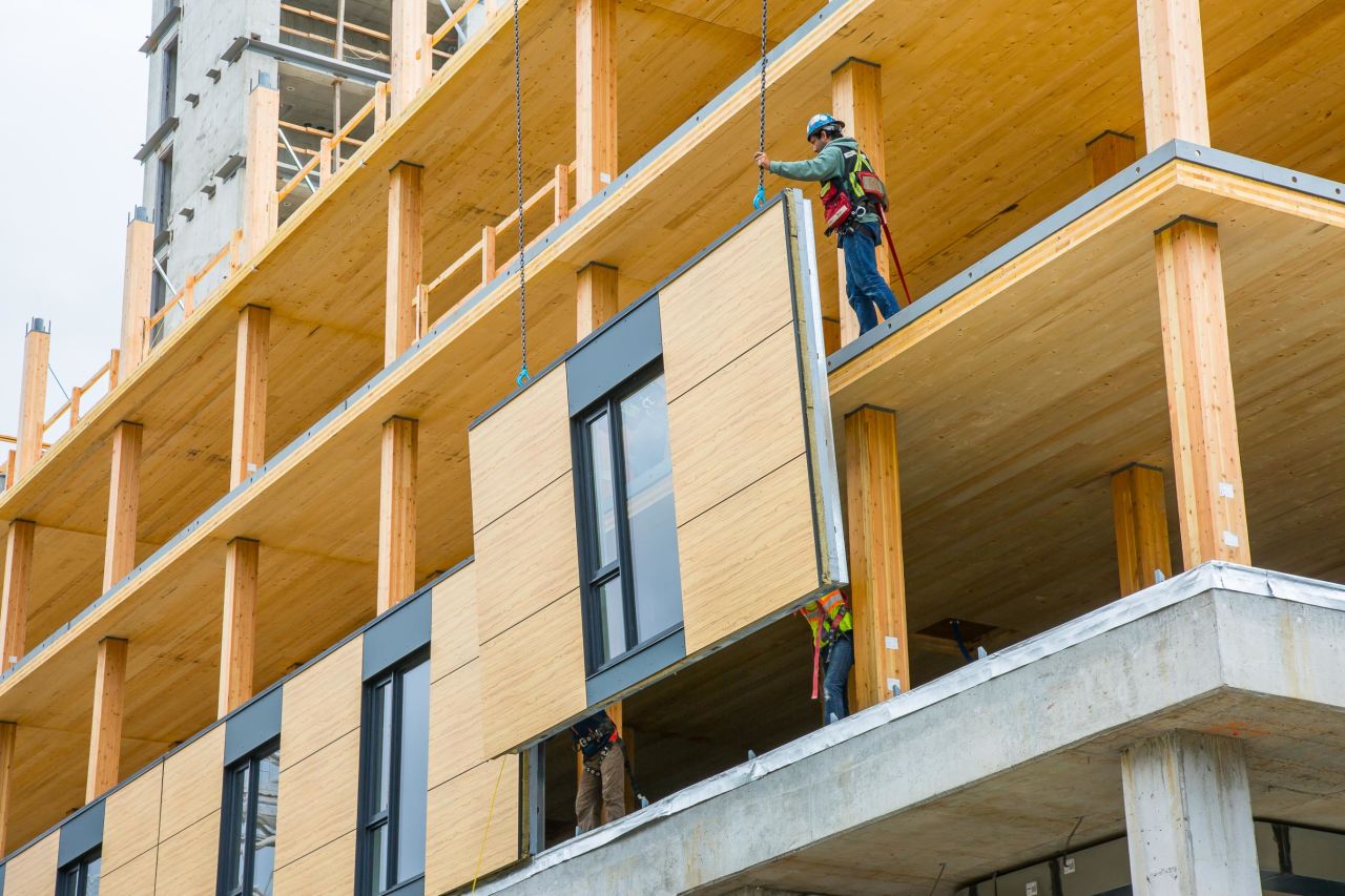 A prefabricated panel is lifted into place during the construction of Brock Commons Tallwood House in Vancouver.