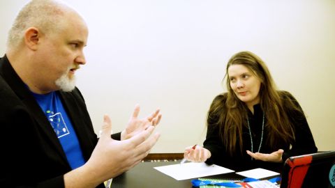 Fred Trotter discusses cybersecurity with Downing during a conference in February 2020.
