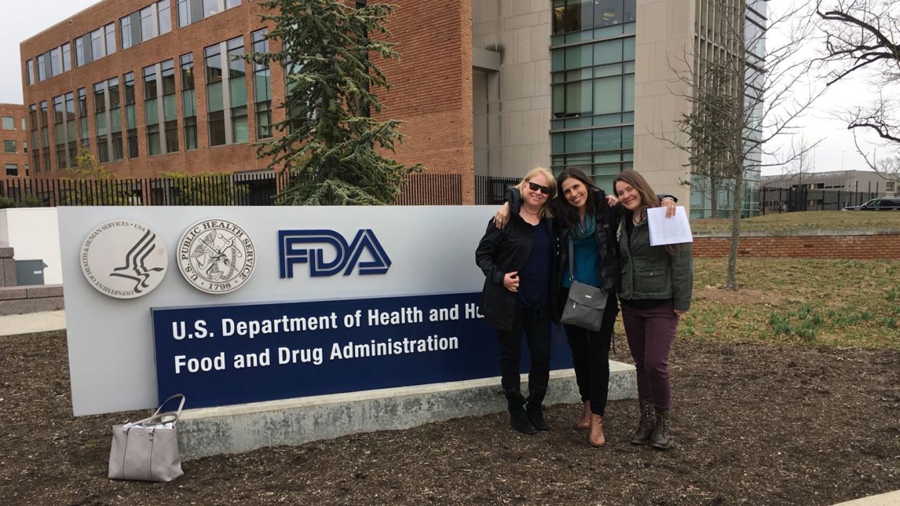 Andrea Downing, right, and fellow advocates prepare for a meeting at the FDA to discuss health data rights.