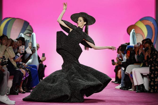 Model Coco Rocha wears the final look of the Christian Siriano collection during Fashion Week, Thursday, Feb. 6, 2020, in New York. 