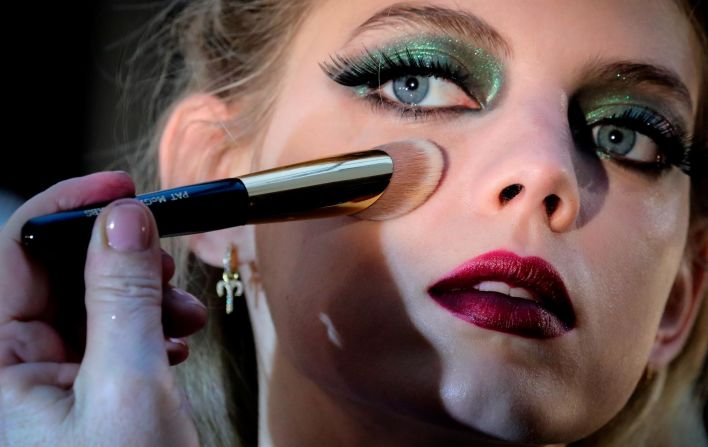 A model is styled backstage before appearing in the Anna Sui fashion show during New York's Fashion Week, Monday Feb. 10, 2020.