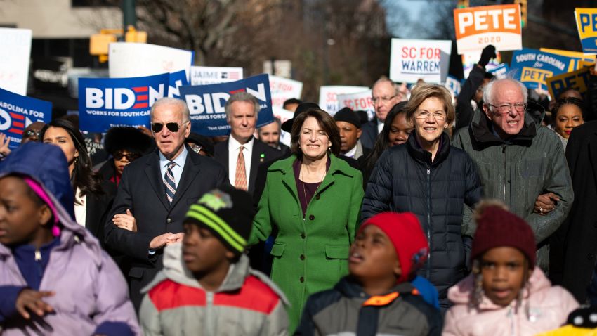 COLUMBIA, SC - JANUARY 20: Democratic presidential candidates, former Vice President Joe Biden, left, Sen. Amy Klobuchar (D-MN), Sen. Elizabeth Warren (D-MA), and Sen. Bernie Sanders (I-VT), right, march down Main St. to the King Day at the Dome event on January 20, 2020 in Columbia, South Carolina. The event, first held in 2000 in opposition to the display of the Confederate battle flag at the statehouse, attracted more than a handful of Democratic presidential candidates to the early primary state. (Photo by Sean Rayford/Getty Images)