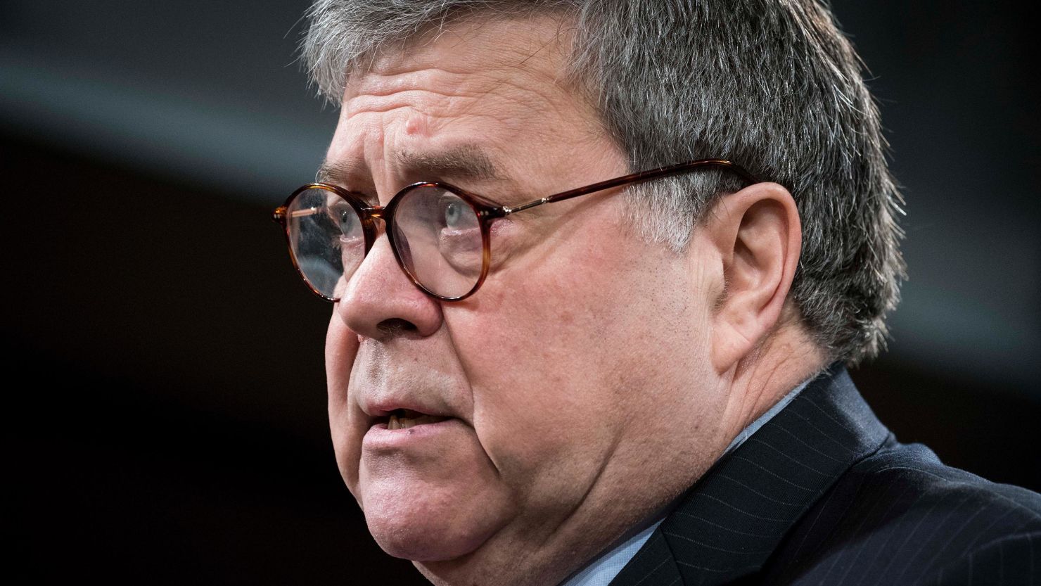 Attorney General William Barr participates in a press conference at the Department of Justice on February 10, 2020 in Washington.