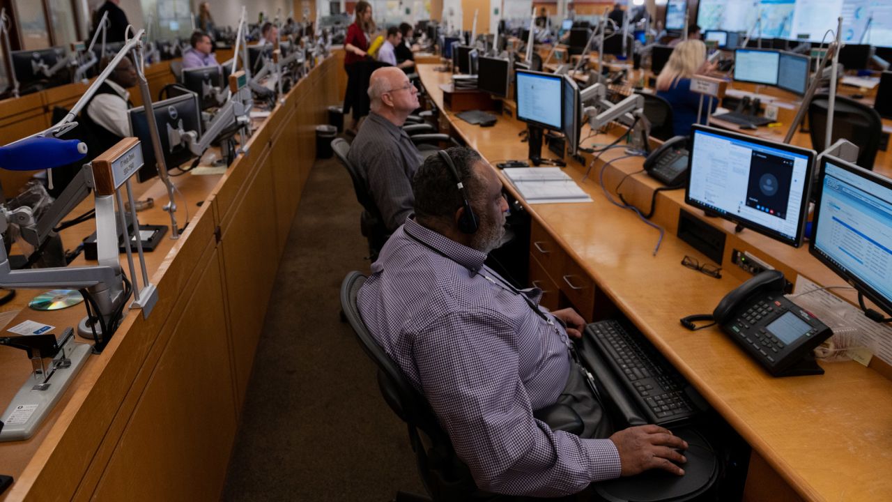 Employees with the Centers for Disease Control and Prevention work at the Emergency Operations Center in Atlanta on Thursday, February 13.