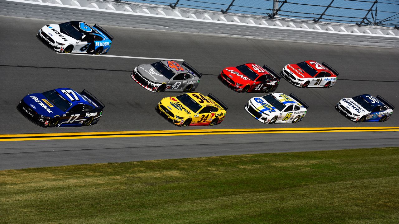 Chris Buescher, driver of the #17 Fastenal Ford, and Ryan Newman, driver of the #6 Koch Industries Ford, lead a pack of cars during practice for the NASCAR Cup Series 62nd Annual Daytona 500 at Daytona International Speedway on February 08, 2020 in Daytona Beach, Florida. 