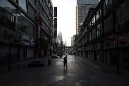 A man walks on an empty street in Wuhan, China, on February 13, 2020.