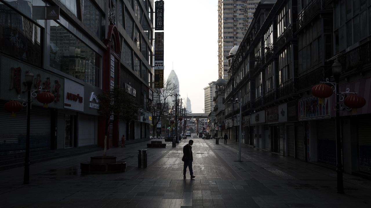 A man walks on an empty street in Wuhan, China, on February 13, 2020.