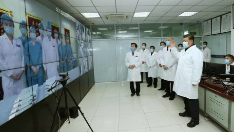 Chinese President Xi Jinping talks to medical staff on duty via a video link at Beijing Ditan Hospital in Beijing on Febuary 10.