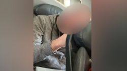 viral video plane passenger punching reclining seat travel quest vpx_00000315