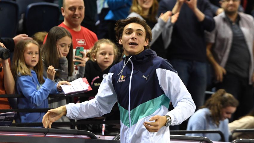 Sweden's Armand Duplantis reacts as he meets fans after clearing six meters to win the men's pole vault final at the Müller Indoor Grand Prix Glasgow 2020 athletics in Glasgow on February 15, 2020. - Sweden's Armand Duplantis set a world pole vault record of 6.18 metres at an indoor meeting in Glasgow on Saturday, adding one centimetre to the record he set in Poland. Duplantis, the 20-year-old who won silver at last year's world championships in Doha, cleared the bar with something to spare. (Photo by ANDY BUCHANAN / AFP) (Photo by ANDY BUCHANAN/AFP via Getty Images)