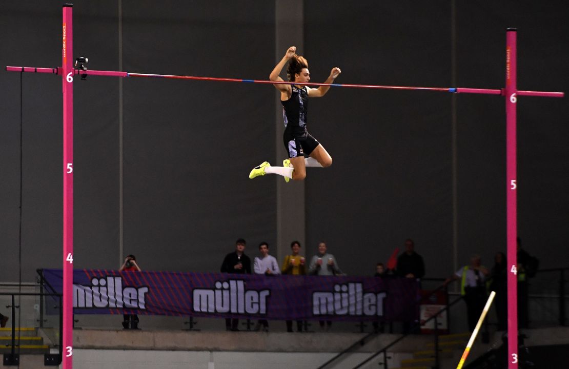 Armand Duplantis reacts as he breaks the world record in Glasgow.