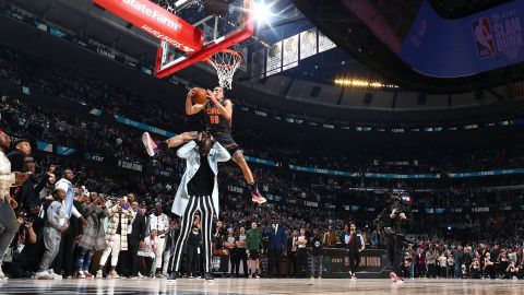 Aaron Gordon of the Orlando Magic dunks the ball over Tacko Fall of the Boston Celtics during the 2020 NBA All-Star - AT&T Slam Dunk on February 15, 2020 at the United Center in Chicago, Illinois.