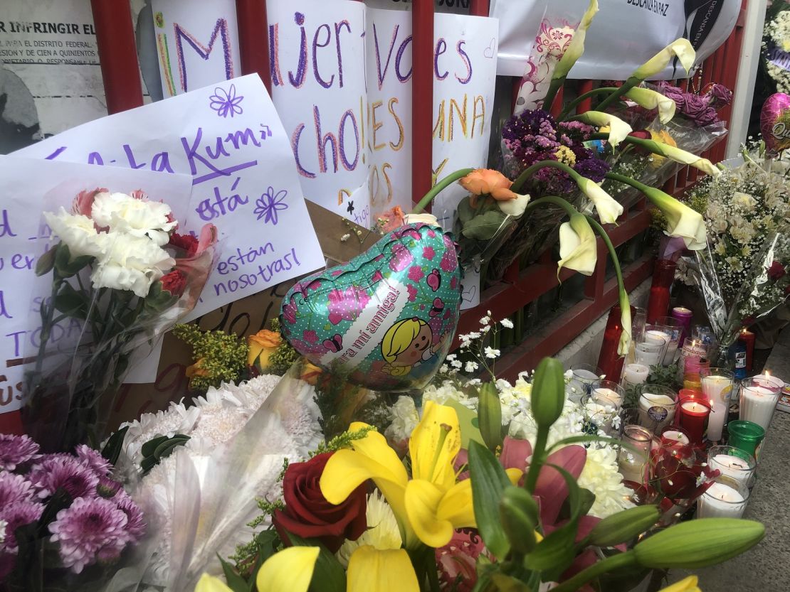 The vigil outside of the building where Ingrid Escamilla was killed. 