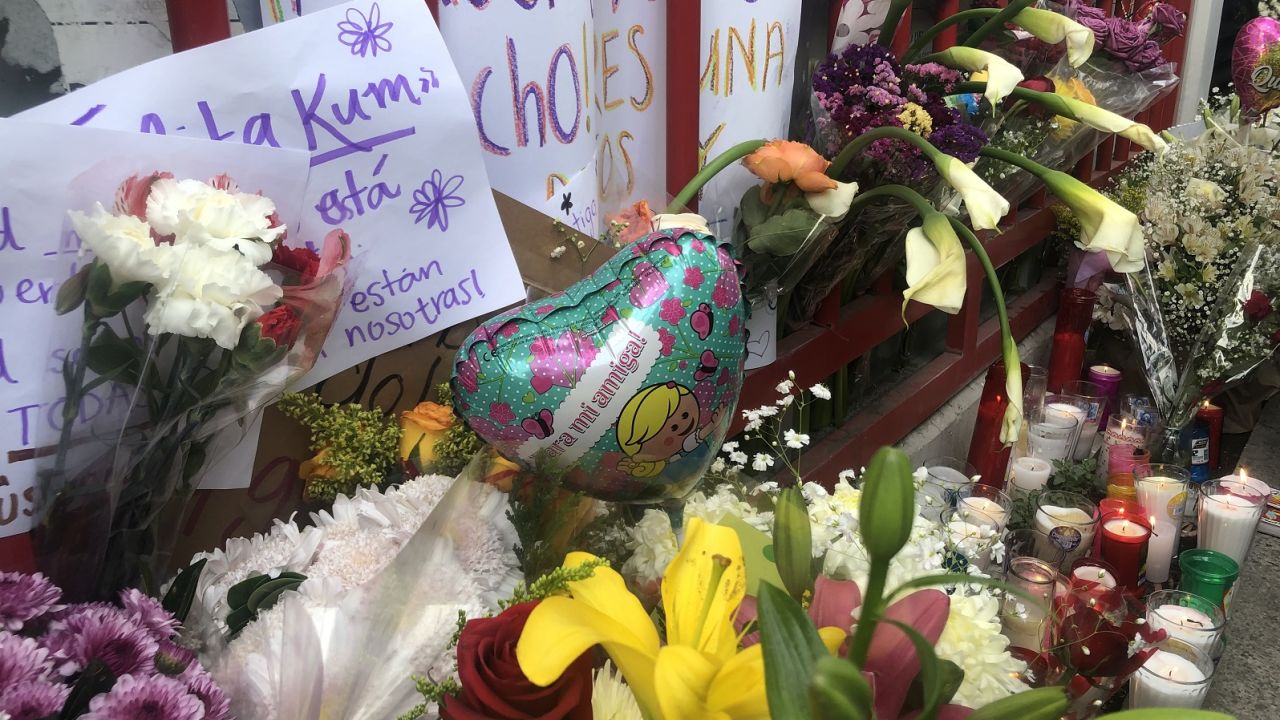 The vigil outside of the building where Ingrid Escamilla was killed.