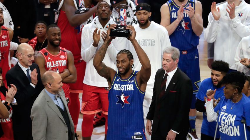 Kawhi Leonard of the Los Angeles Clippers holds up his NBA All-Star Game Kobe Bryant MVP Award after the NBA All-Star basketball game Sunday, Feb. 16, 2020, in Chicago.