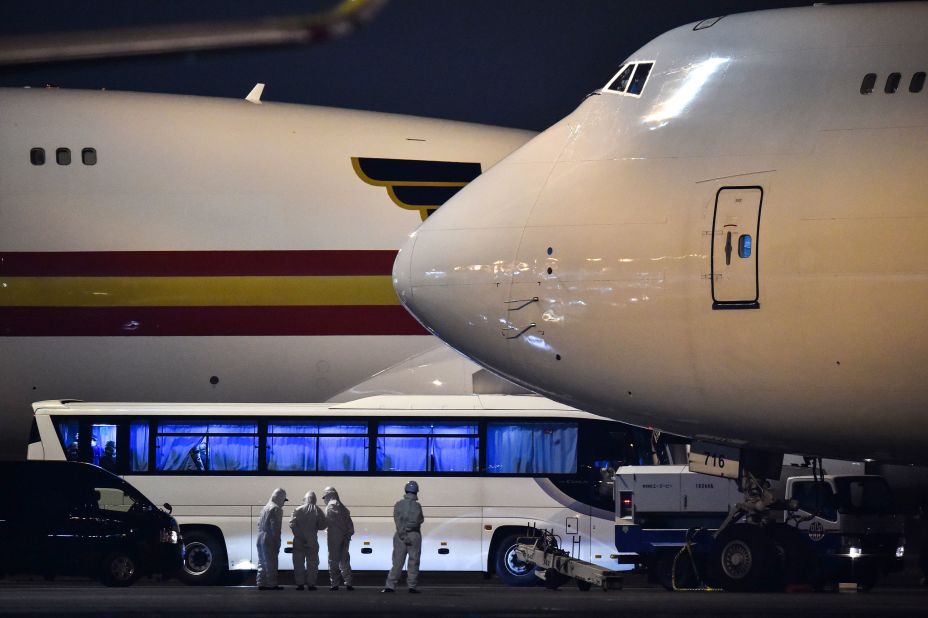 Buses carrying American passengers arrive at the Haneda Airport in Tokyo on February 17, 2020. The passengers <a href="https://www.cnn.com/2020/02/17/health/diamond-princess-american-evacuees-flight/index.html" target="_blank">were leaving the quarantined Diamond Princess cruise ship</a> to be repatriated to the United States.