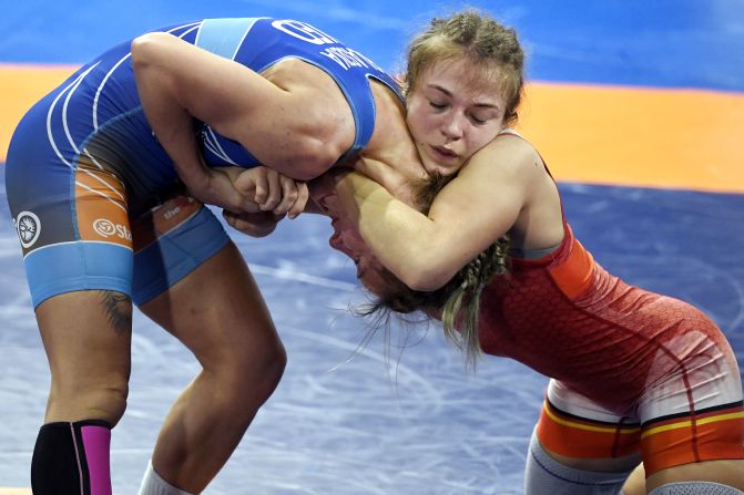 Jessica Cornelia Francisca Blaszka of the Netherlands, left, and Annika Wendle of Germany compete during the semifinal of the women's 53kg weight class at the European Wrestling Championships in Rome, Italy, on February 13.